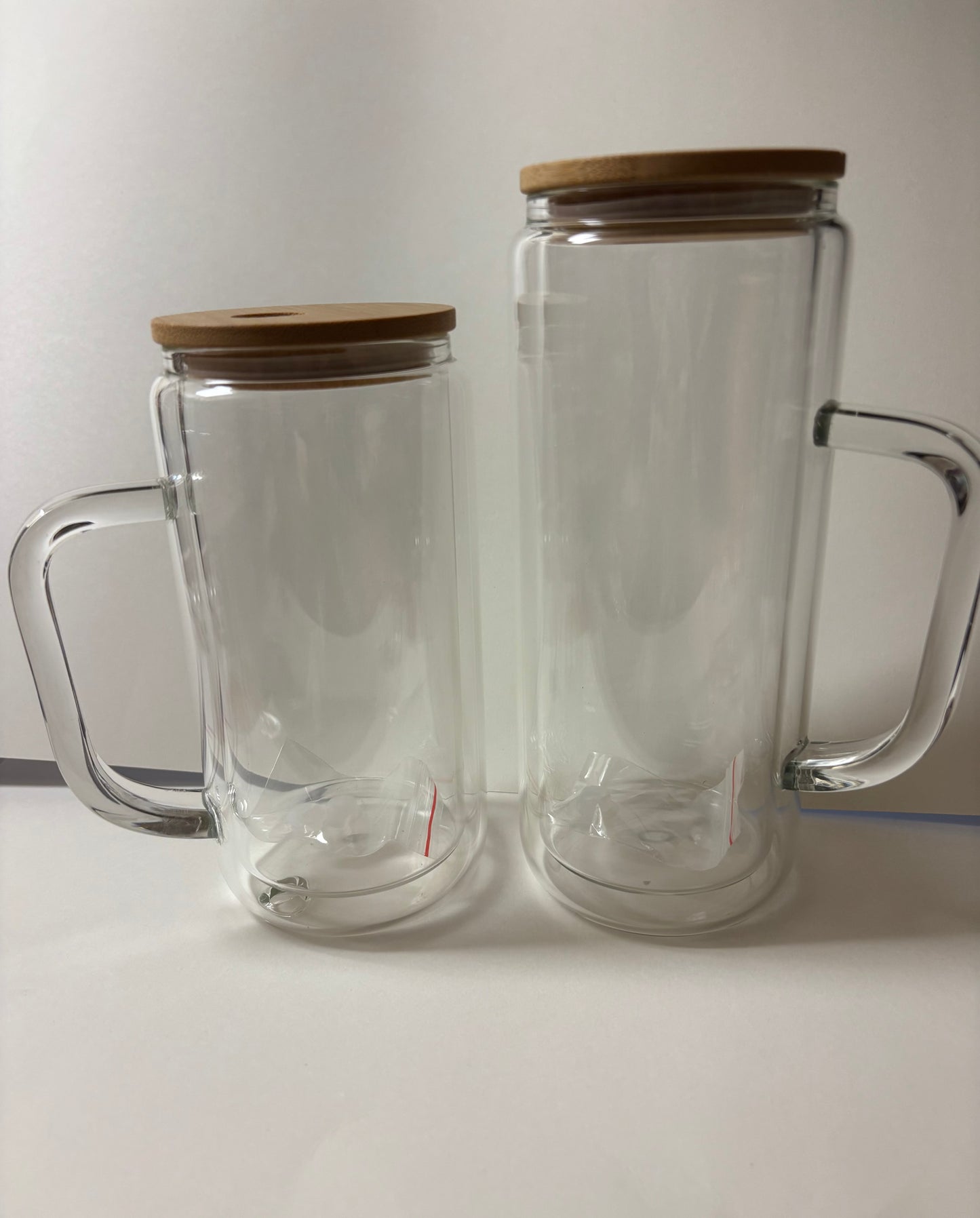 Glass snow globe cup with handle
