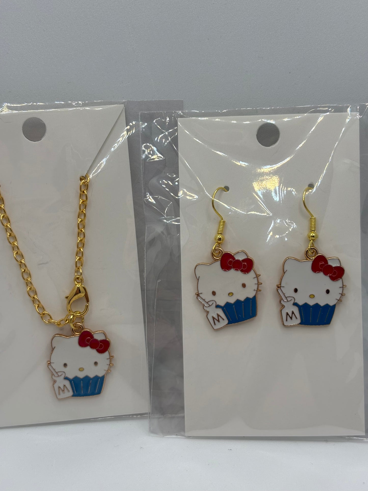 HK Cup Charm and Earrings Set.